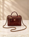 CHANEL Croc-Embossed Mini Vanity Bag